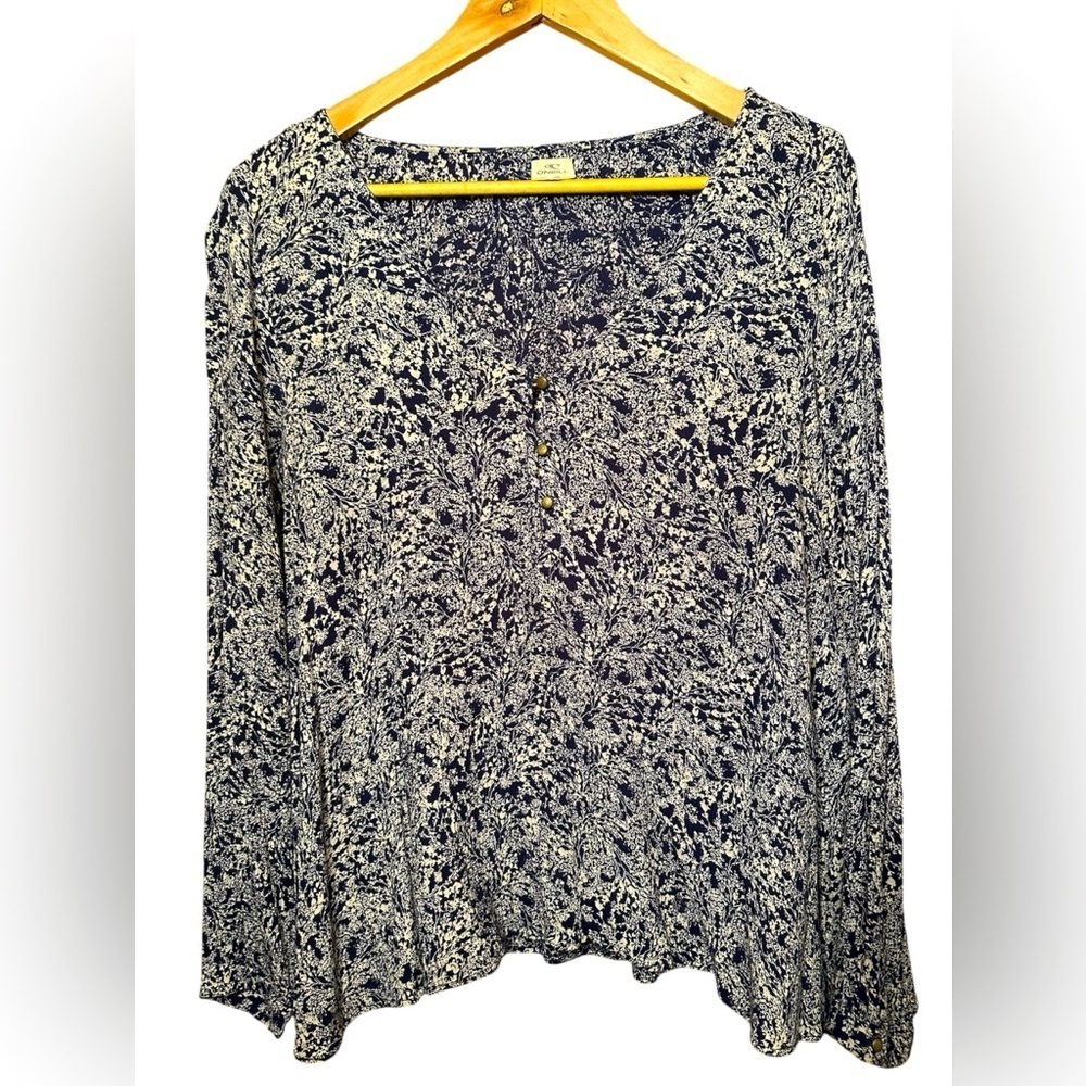 O’Neill size small blue and white printed asymmetrical top